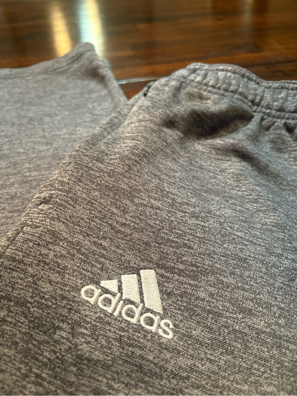 Grey Adidas sweatpants with pockets size Men’s  L